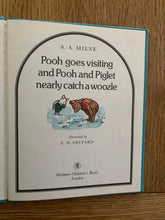 Pooh goes fishing and Pooh and Piglet nearly catch a woozle