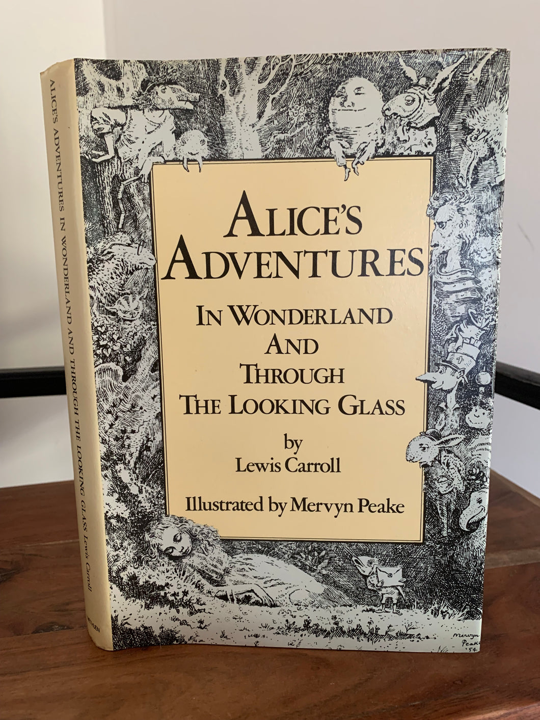 Alice's Adventures in Wonderland and Alice Through The Looking Glass