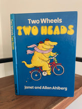 Two Wheels Two Heads