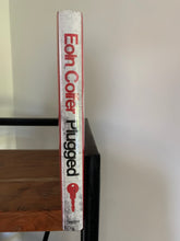 Plugged (signed)