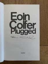 Plugged (signed)