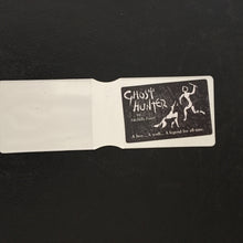 Ghost Hunter. With promotional card and holder